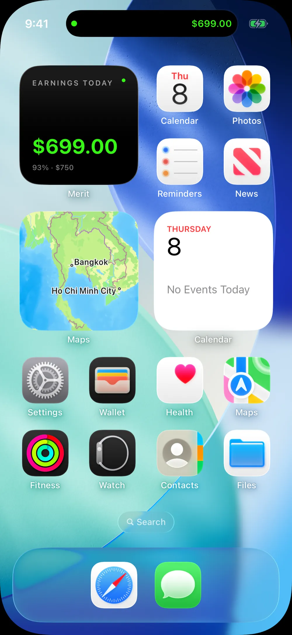 An iPhone's Dynamic Island showing Merit's amount, $699.00, in green.